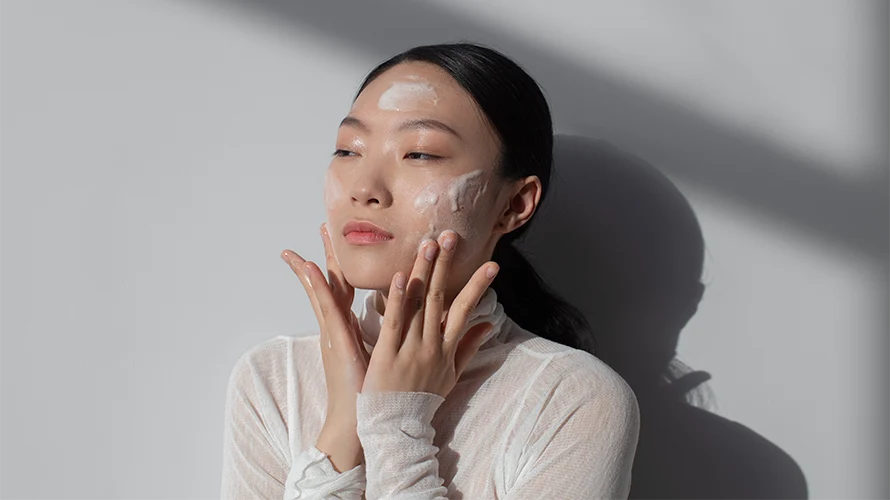 woman using korean skincare brands products - 1